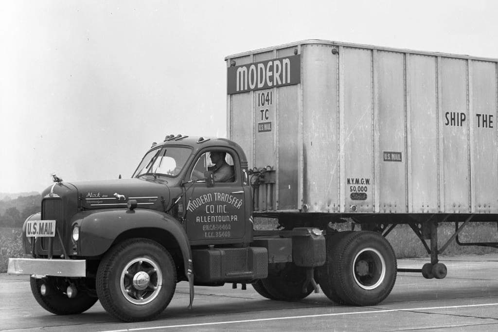 about us background picture of a 1900's truck