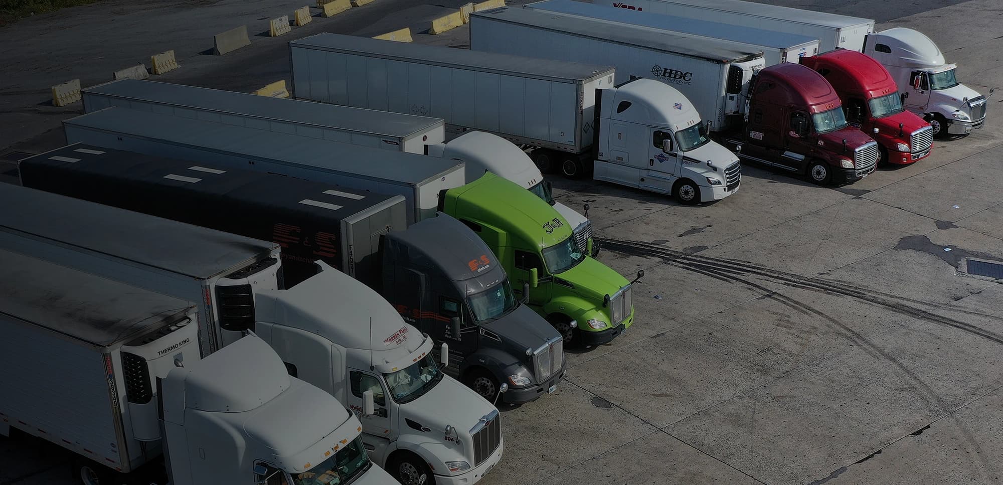 Background picture of trucks at our Perth depot